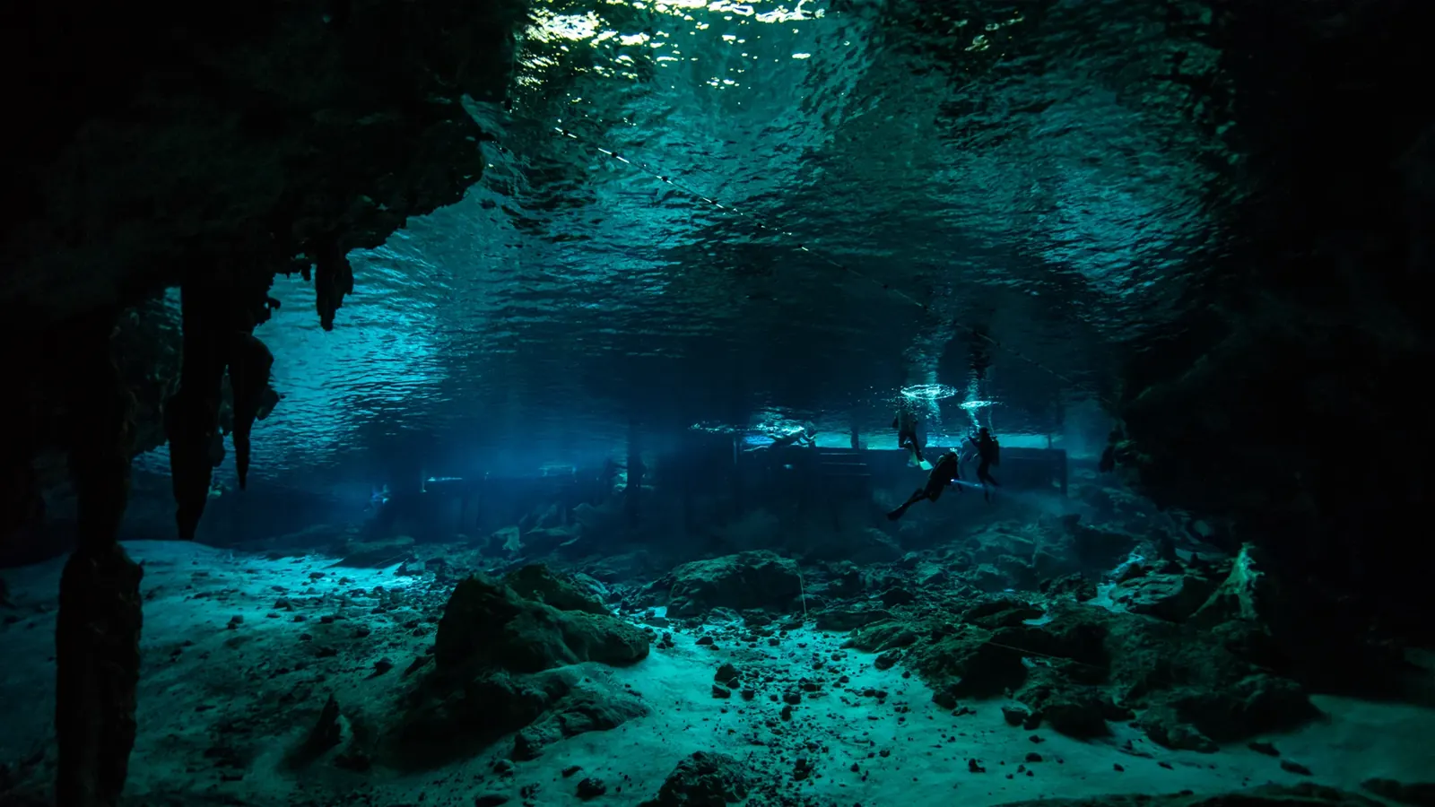 Cavern line and light beams in Cenote Dos Ojos